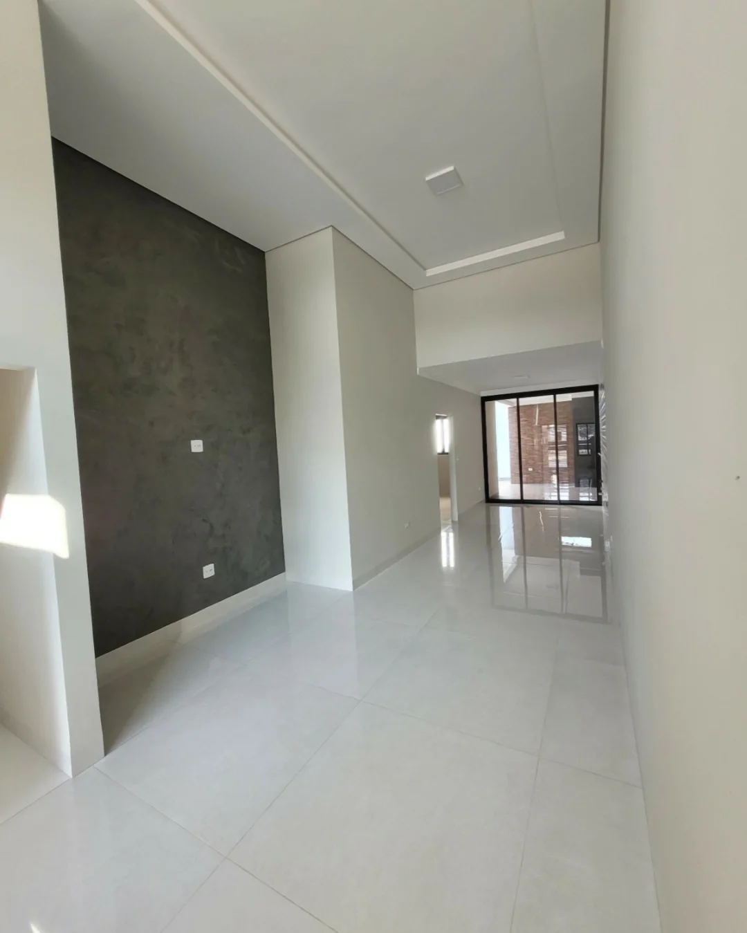 Sala · Pé-direito duplo — MHS Construtora